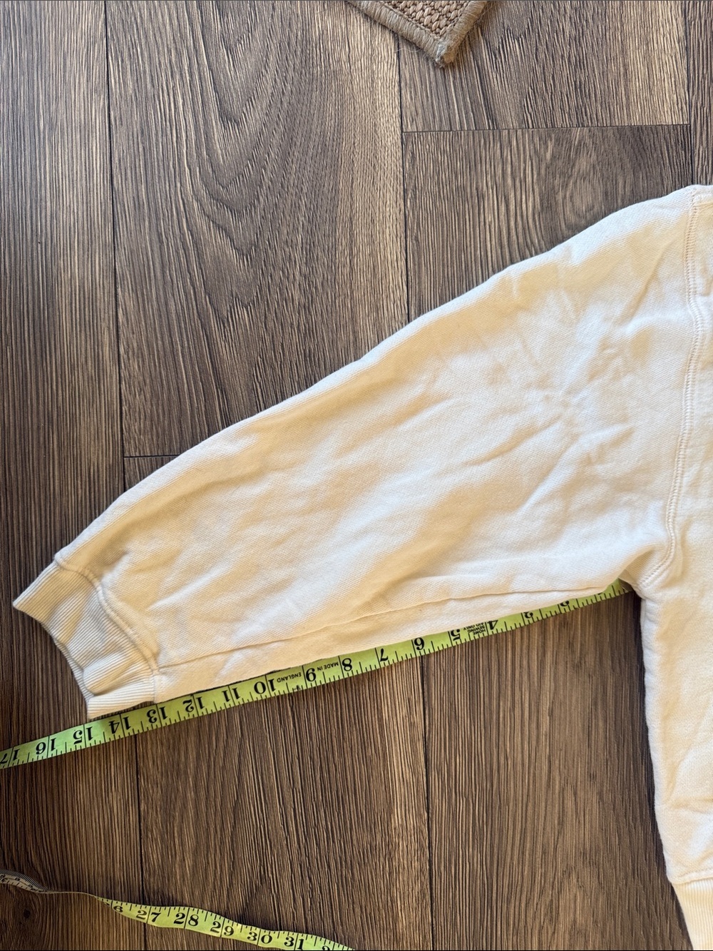 This cream Pilcro embroidered sweatshirt from Anthropologie features a "shimmer - Picture 11 of 12